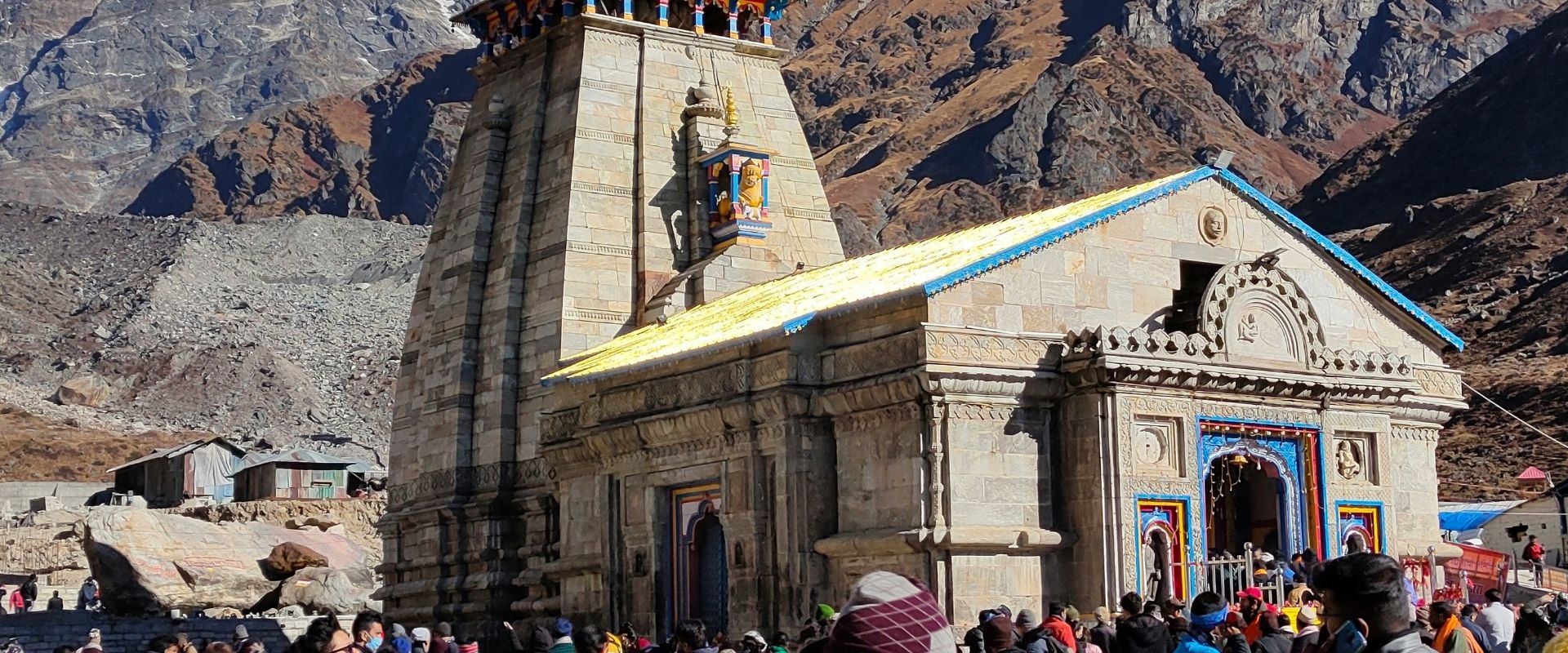 Kedarnath Temple surrounded by snow-covered Himalayan mountains in Uttarakhand